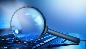 magnifying glass laptop